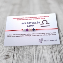 Raudonojo siūlo apyrankė svarstyklių zodiako ženklo atstovui